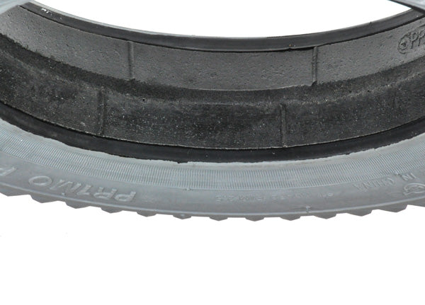 14x3 (3.00-8) Foam-Filled Mobility Tire with Powertrax Knobby Tread for Quickie Scooters, featuring a close-up view of the black rubber tire with detailed tread pattern.