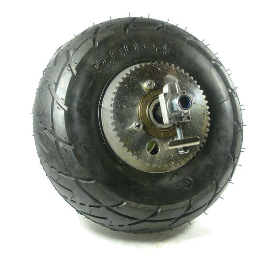 3.00-4 Rear Wheel Assembly with #25 Chain Sprocket, featuring a black tire with a metal wheel, visible treads, and rim. Includes tire, inner tube, brake assembly, and wheel bearings.