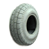 4.10x3.50-5 Mobility Tire and Tube Set with Homer Tread, featuring a close-up of the tire with a visible hole, highlighting the tread pattern and synthetic rubber material.