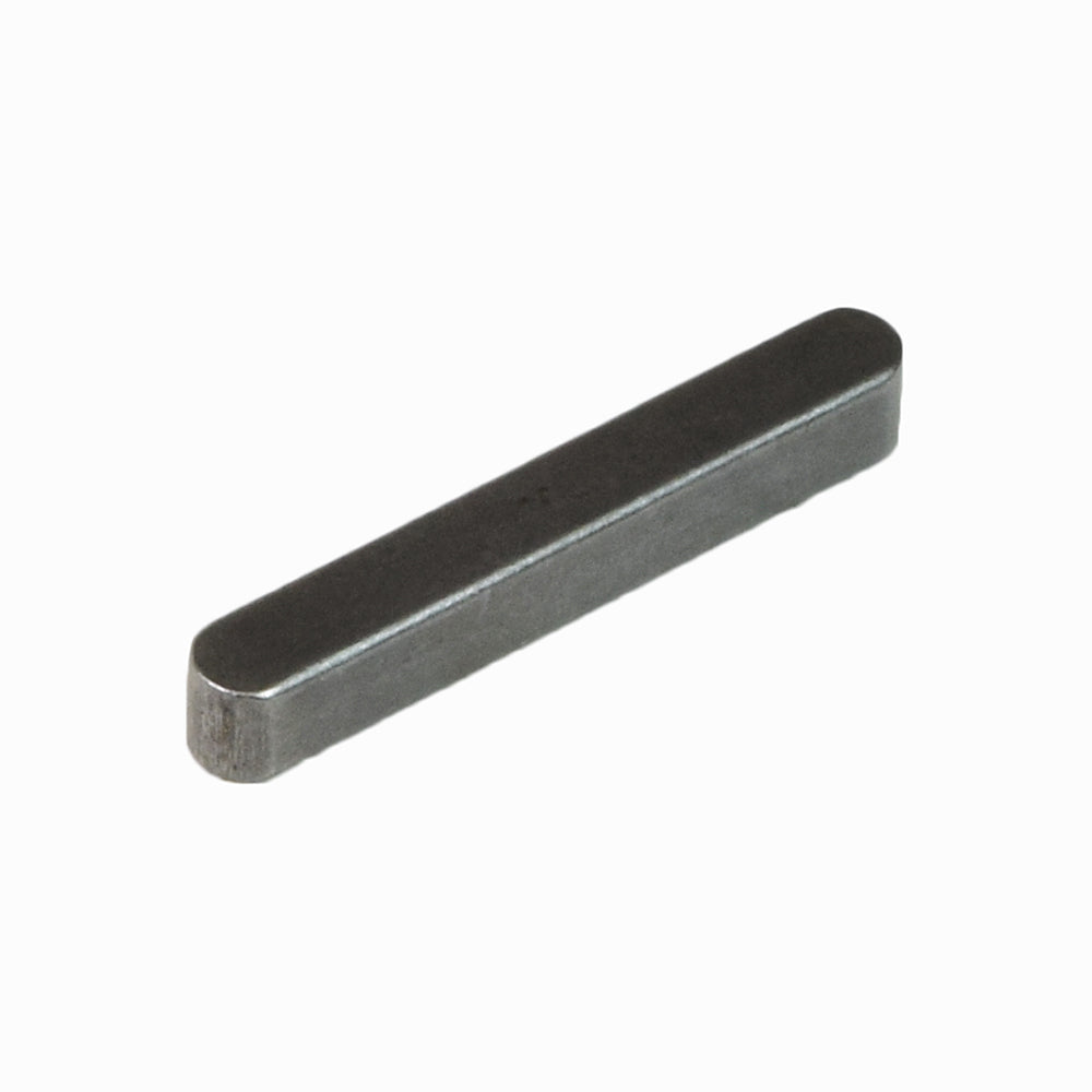 Close-up of a 5 mm x 5 mm x 35 mm Axle Key, a rectangular metal tool essential for power chairs and scooters.