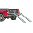 Tri-Fold ATV and Go-Kart Ramp Set attached to a truck bed, featuring sturdy, galvanized steel construction; capable of supporting 1000 lbs.