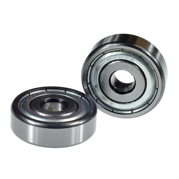 Close-up of a pair of 6300ZZ (6300Z) shielded wheel bearings for mobility scooters and power chairs, made of chrome steel with metal shields on both sides.