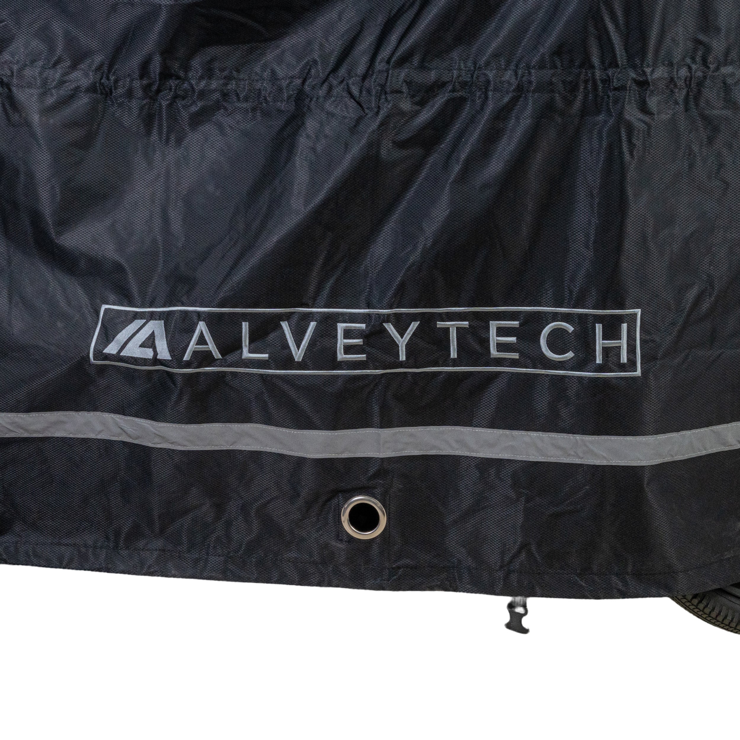 Close-up of the Universal Deluxe Electric Bike & Scooter Weatherproof Cover, showcasing its heavy-duty black 600D polyester fabric with white lettering, reinforced grommets, and drawstrings for secure fit.