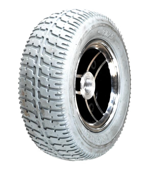 Close-up of the 7 solid rear wheel assembly for Drive Falcon 3 and Falcon 4 mobility scooters, highlighting the robust tread and durable synthetic rubber construction.