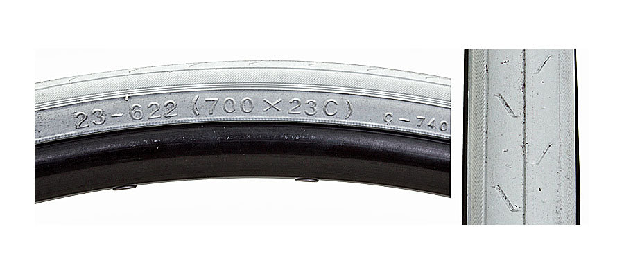 Close-up of the 700x23 Super HP CST740 Bicycle Tire from Sunlite, showcasing detailed tire tread and part of a white metal surface.