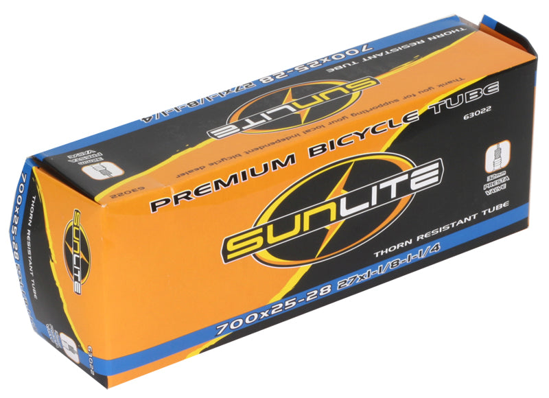 Box containing a 700x25-28 Heavy Duty Thorn Resistant Bicycle Inner Tube with 32mm Presta Valve by Sunlite, clearly labeled and packaged for replacement of old bike inner tubes.