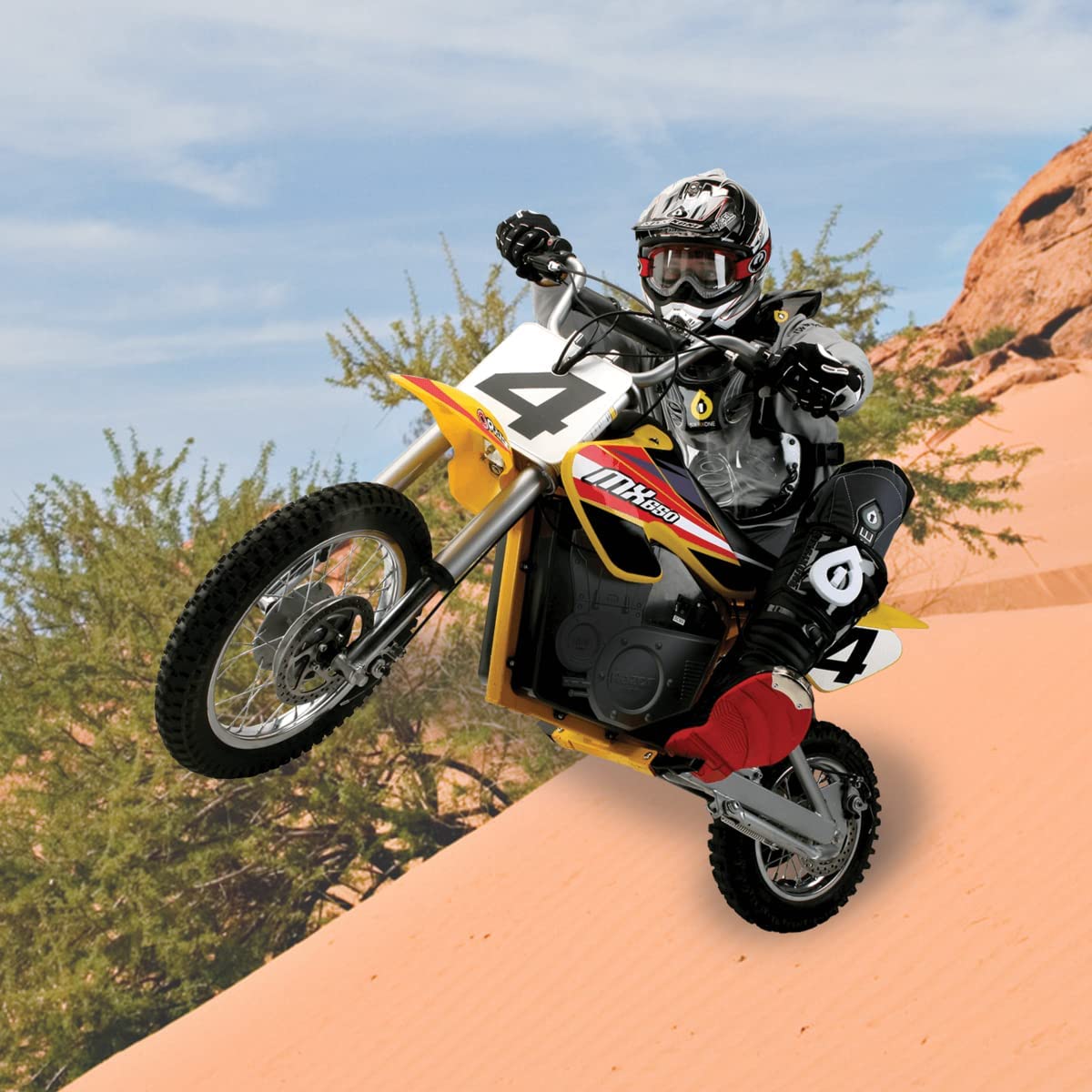 2.5-10 Tire & Tube Set for Baja, Honda, Minimoto, Motovox, & Razor Dirt Bikes, shown in use during an off-road jump, emphasizing durability and performance in extreme conditions.