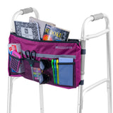 Deluxe Universal Walker/Rollator Bag with various items including a book, sunglasses, markers, scissors, and a notebook, showcasing its ample storage and practical design for easy attachment to mobility aids.