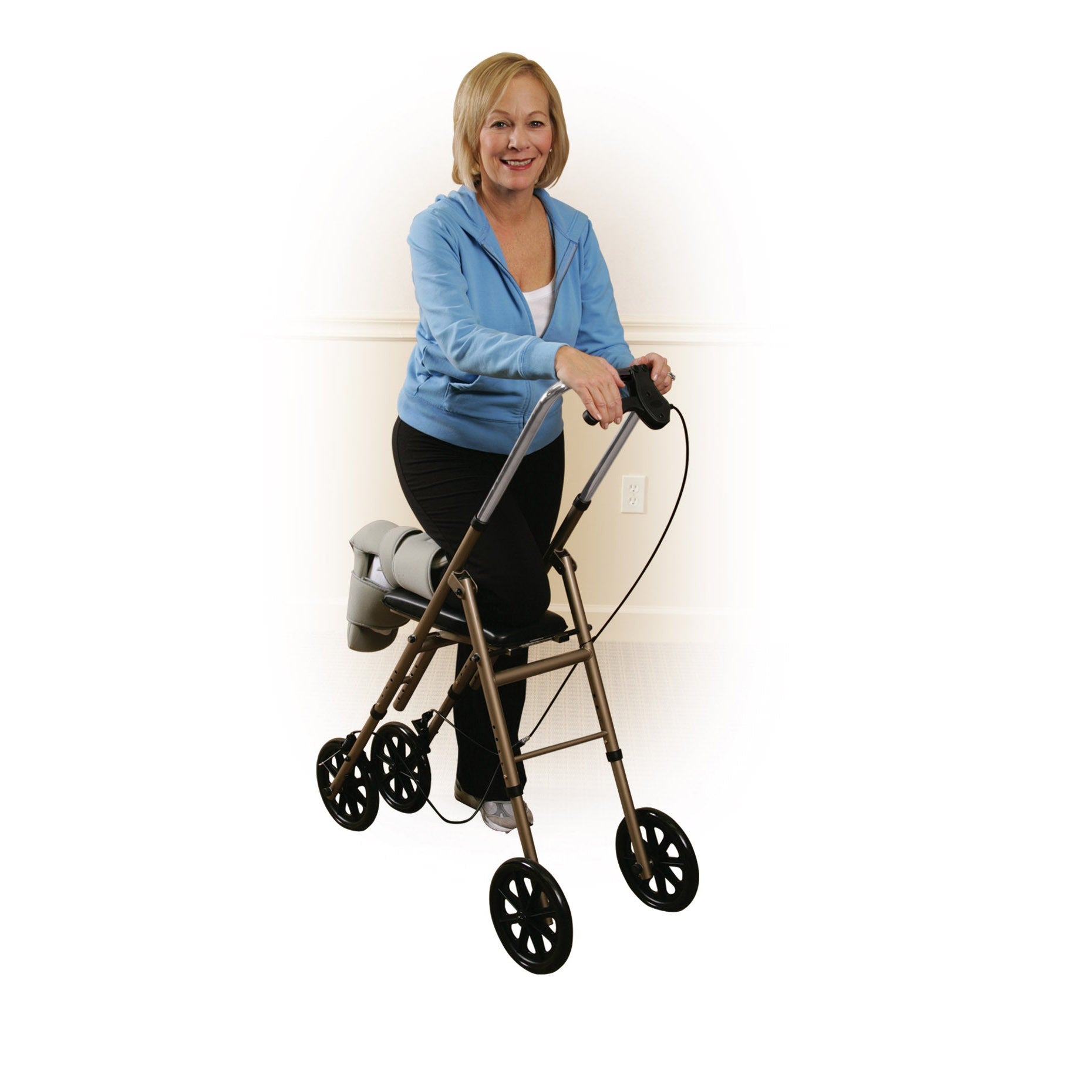 Drive Medical 780 Adult Knee Walker with 8 wheels, shown in use by a woman. The knee walker features height adjustability, a handbrake, and a stable design for enhanced mobility.