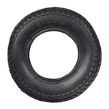 8-1/2x2 Kick Scooter Tire with P1034 Tread, featuring a close-up view of the tire's directional tread pattern and the embossed arrow indicating the correct mounting direction.