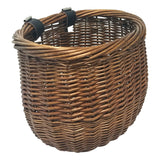 Willow Bushel Strap-On Handlebar Basket for Bikes & Scooters, featuring a classic woven wicker design, leather straps, and buckle mounts, showcased in a close-up view highlighting its texture and construction.