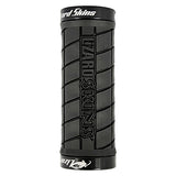 90 mm Lock-On Shorty Grips for Bikes & Scooters, featuring a black handlebar with white text, close-up of a tire, showcasing durable, dependable lock-on design for secure, comfortable rides.