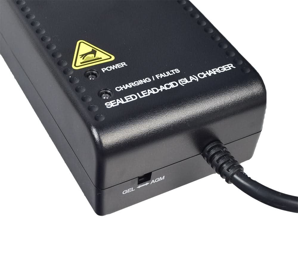 Close-up of the charger's power and charging status LEDs and Gel/AGM selector switch