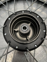 14 (2.50-14) Front Wheel Assembly for Dirt Bikes (Blemished) - Close-up of black metal spokes, rim, and knobby tire. Suitable for 50cc, 70cc, and 90cc Chinese dirt bikes.