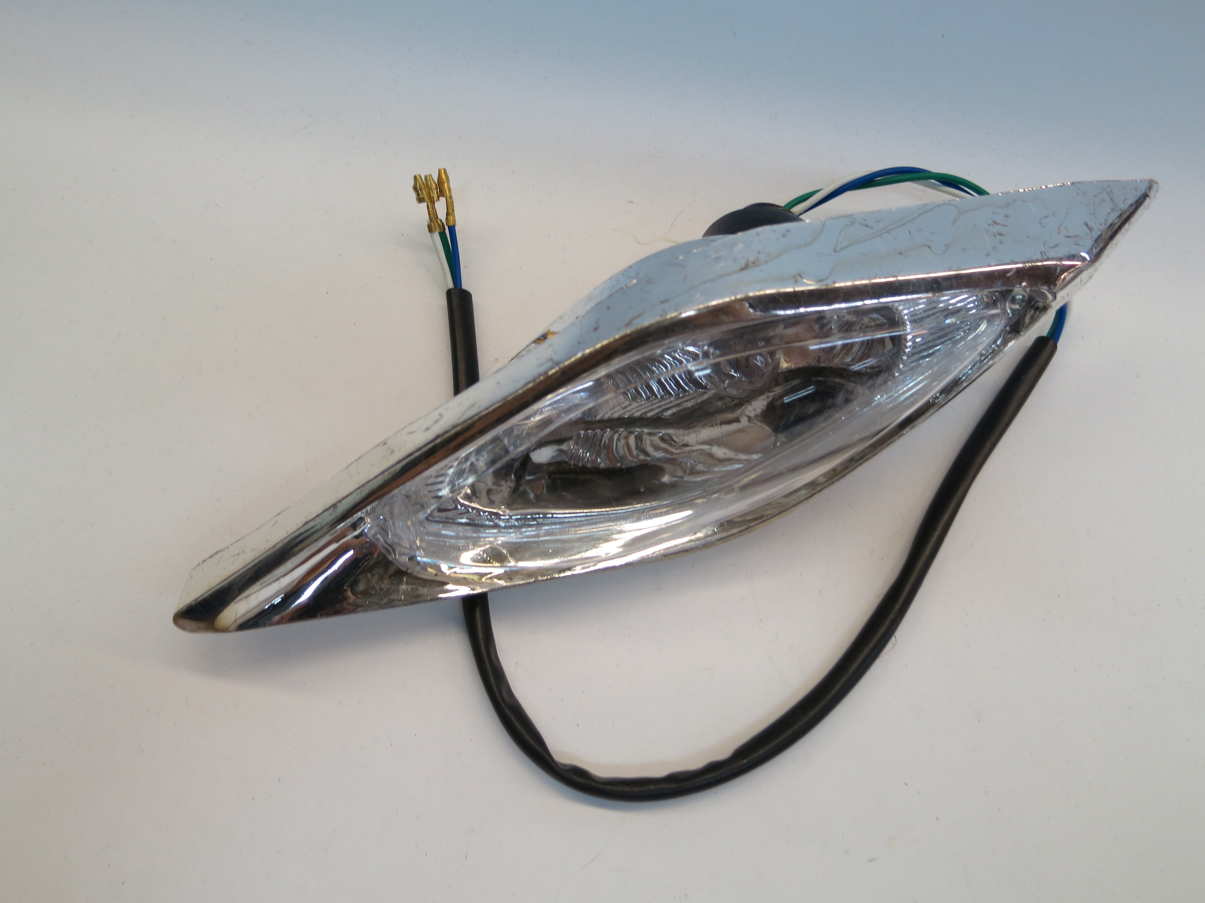 Headlight Assembly for 90cc Baja 90 (BA90) and Wilderness 90 (WD90) ATVs (Blemished) showing a close-up of the headlight with attached wires.