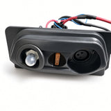 Close-up of the Golden Buzzaround XL (GB121) battery box side panel with the push-button circuit breaker under its clear cover, the fuse, and the 3-pin charger port, with the attached wiring.