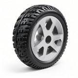 Golden Companion II 4-Wheel (GC440) silver rear wheel assembly MBW-0020, angled view showing the black tire tread and silver rim.
