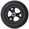 Golden Cricket Travel Power Chair Wheel - A black rubber wheel with a multi-spoke hub and a visible silver ball bearing in the center, photographed on a clean white background. The tire size '7X1.