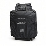Travel bag kit for the Jazzy Carbon and Jazzy Ultra Light fitted over a folded power chair, with the battery bag attached on top