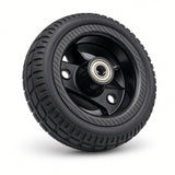 Go-Go Carbon front wheel assembly with two-spoke black rim and carbon-fiber-pattern hub cover