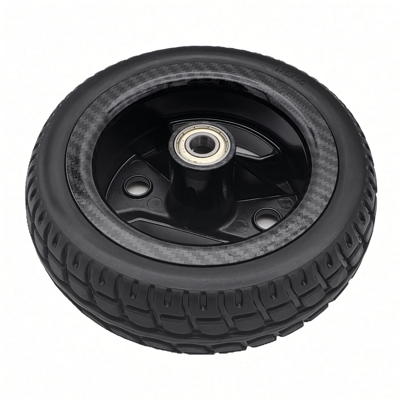 Flat-free 175x50 solid tire tread on Pride Go-Go Carbon front wheel assembly