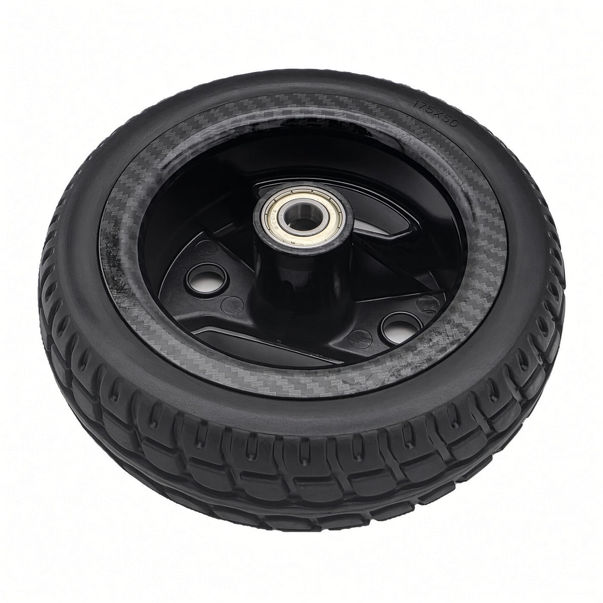 Flat-free 175x50 solid tire tread on Pride Go-Go Carbon front wheel assembly