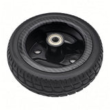 Flat-free 175x50 solid tire tread on Pride Go-Go Carbon front wheel assembly