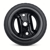 Flat-free solid tire tread on the Pride Go-Go Carbon rear wheel assembly