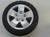 13x4 Low Profile Pneumatic Wheel Assembly for Pride Pursuit XL and Victory XL, featuring a 13 tire with a silver rim and C-9328 tread pattern, suitable for front or rear use.