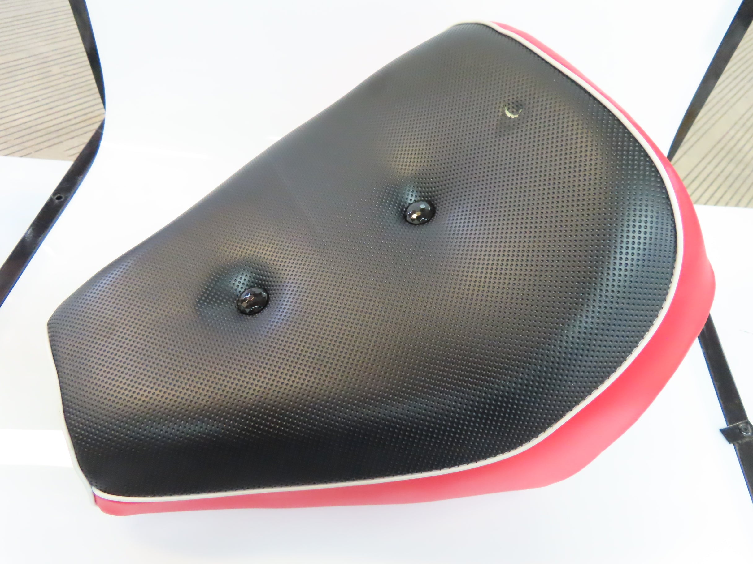 Black & Red Seat for the Baja MB165 & Falcon Mini Bikes (Blemished), featuring a close-up view of the red-trimmed black seat with visible stitching and button detailing.