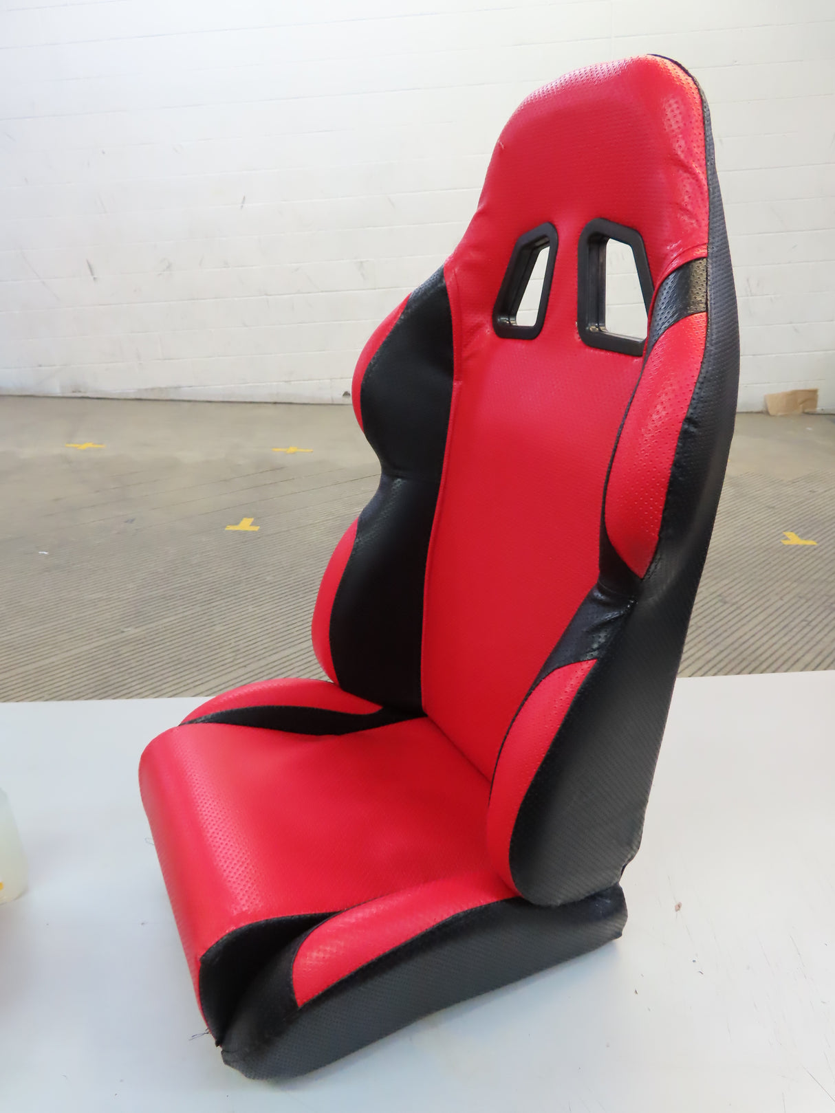 Red Single Seat for Go-Karts (Blemished) with black trim, featuring twin back vents and side padding for comfort, designed as a high-quality replacement part for go-karts.