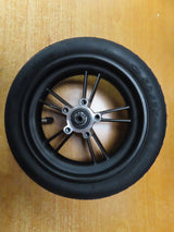 Rear Wheel Assembly for GOTRAX GXL V2 & XR Ultra Electric Scooters (Blemished) featuring a 5-spoke rim, pre-installed 6001RS bearings, and mounted tire on a wood surface.