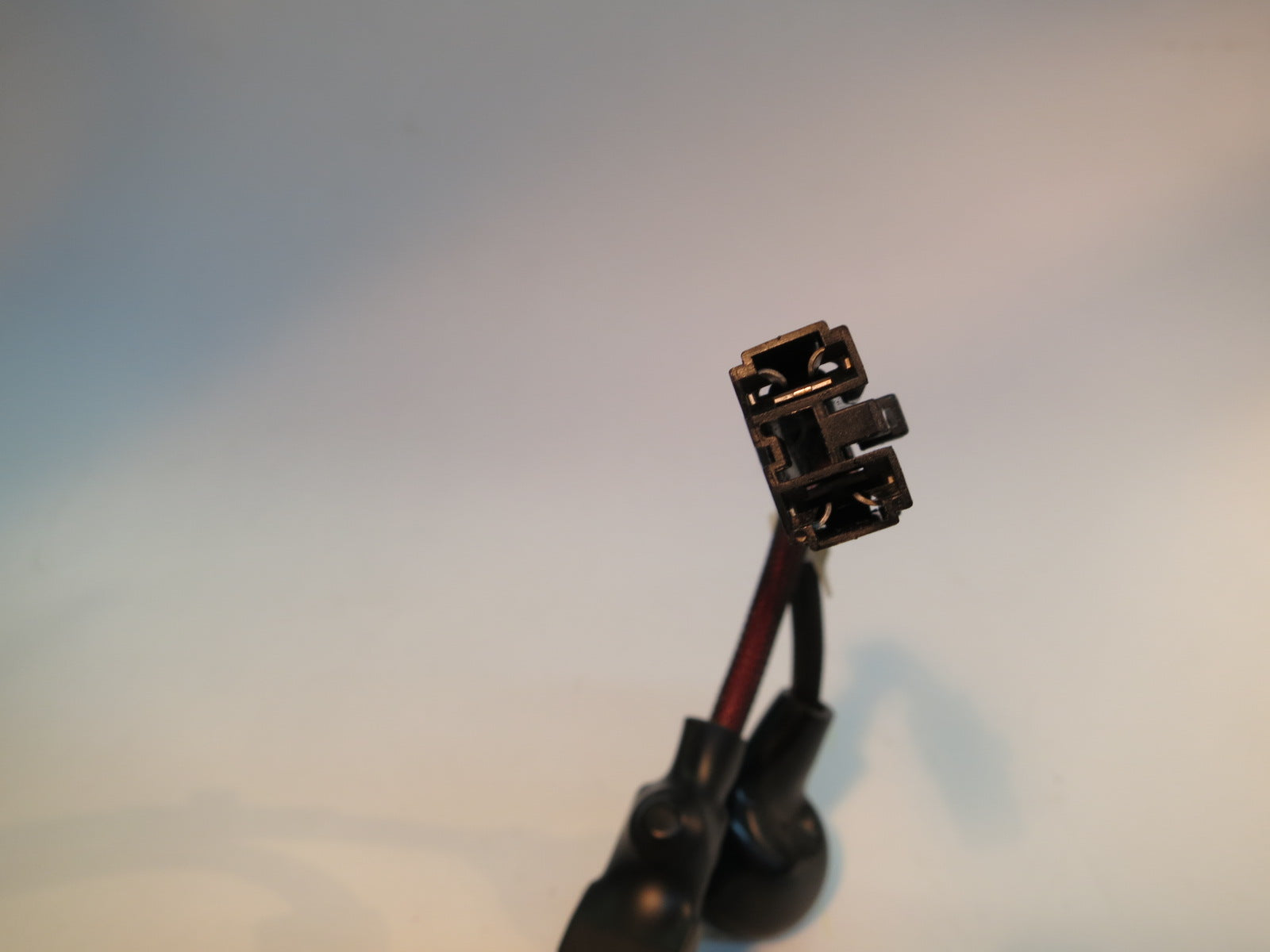 Close-up of the Battery Harness for the Jazzy 614, 614HD, & Quantum Q614 power chairs, showing the black connector, cables, and terminal eyes.