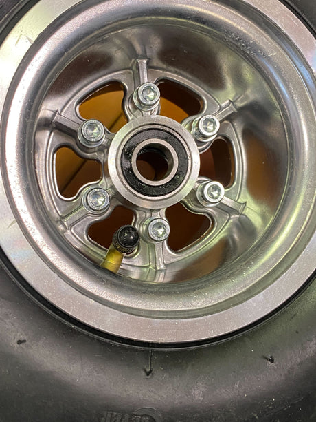 Close-up of the Rear Drift Wheels for the Razor DXT Electric Drift Trike (Set of 2), showcasing the slick, treadless tires and 6002-2RS bearings, designed for enhanced drifting performance.