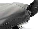 17 Wide Molded Seat Assembly for Go-Go and Pride Mobility Scooters, featuring a black leather seat with exposed metal screws and missing armrests.