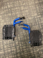 Footrest for the Drive Medical Blue Streak Manual Wheelchair (Set of 2) (Blemished) showing minor scuffs on the mounting bracket and lever, placed on a carpet.