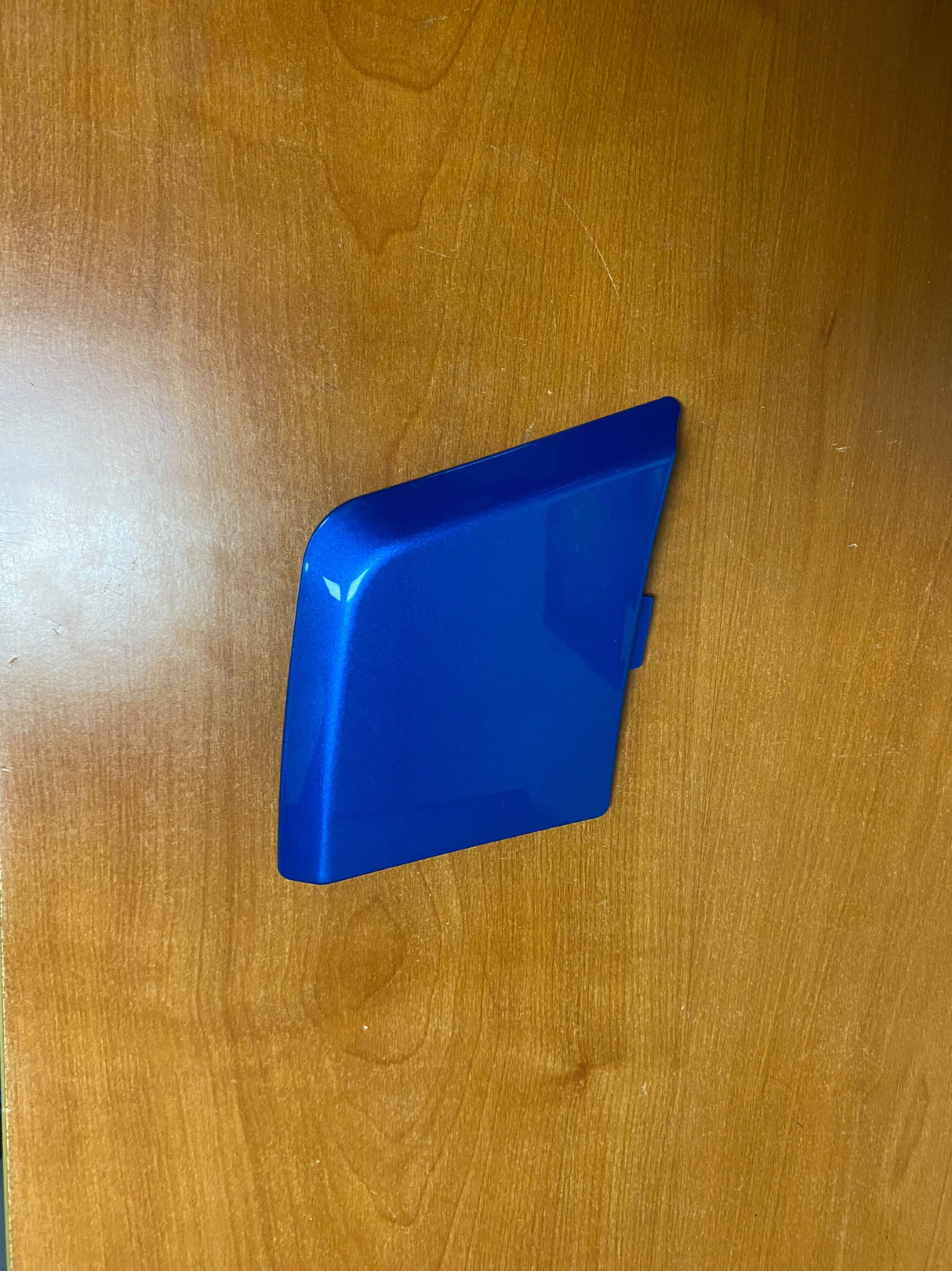 High Capacity Battery Box Shroud Assembly Inserts in Blue for the Go-Go LX (S50LX/S54LX) (Blemished) featuring minor scuffs and scratches, displayed on a wooden surface.