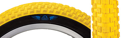 Close-up of a 16x2.125 Cub Bicycle Tire showcasing its classic BMX-style street tread, a result of the Vee Tire and SE Bikes collaboration, highlighting vintage styling elements.