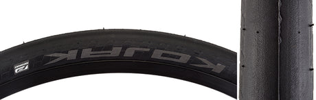 Close-up of a 16x1-1/4 Kojak Performance Lite RaceGuard Bicycle Tire showcasing its smooth, tread-less slick design with checkered shoulders for enhanced cut protection.