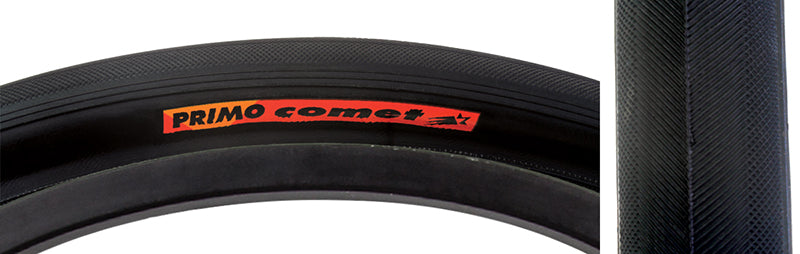 Close-up of the 16x1-3/8 Comet Bicycle Tire, showcasing its black rubber surface with subtle grooves for traction and a visible red and black logo sticker.