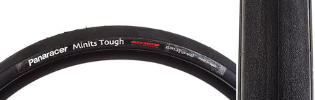 Close-up of a 20x1.25 Minits Tough Bicycle Tire, showcasing its lightweight, fast-rolling design ideal for commuting or touring. The tire's detailed tread pattern is visible, emphasizing durability and efficiency.