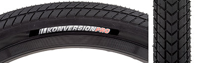 Close-up of the 20x1.5 Konversion Pro Bicycle Tire, showcasing its tread pattern and lightweight casing designed for BMX racing, highlighting the Dual Tread Compound and casing knurling for enhanced cornering performance.