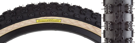 Close-up of a 20x1.75 Comp-III Bicycle Tire showing the detailed tread pattern, designed for lightweight BMX racing with excellent traction on hardpack dirt tracks.