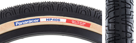 20x1.75 Black HP406 Bicycle Tire showcasing a close-up of the tire's detailed tread and gum walls, highlighting its high-quality flatland design and excellent pavement grip.