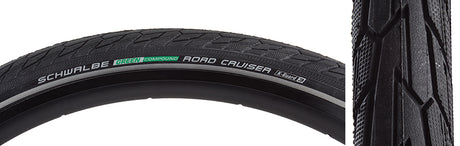 Close-up of the 20x1.75 Reflective Black/Black Road Cruiser Active Twin K-Guard Bicycle Tire, showcasing its directional tread profile and puncture protection features.