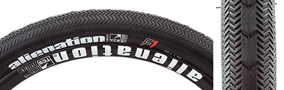 Close-up of a 20x1.95 Black TCS F1 Bicycle Tire showcasing its directional tread pattern, firm center, and soft shoulders, designed for front racing with a tubeless compatible system.