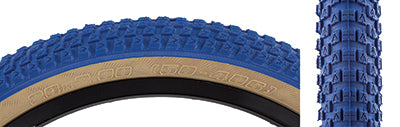 Close-up of a 20x2.0 Blue/Tan Cub Bicycle Tire showcasing its classic BMX street tread design from the Vee Tire and SE Bikes collaboration.