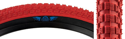 20x2.0 Red/Black Cub Bicycle Tire, showcasing a close-up of its BMX style street tread, designed by Vee Tire and SE Bikes for durability and versatility across all terrains.