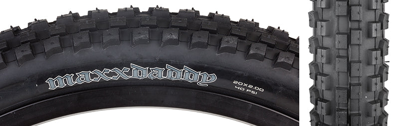 Close-up of the 20x2.0 MaxxDaddy SC Bicycle Tire, showcasing its tread and durable single compound casing, ideal for hard-pack berms and loose soil.