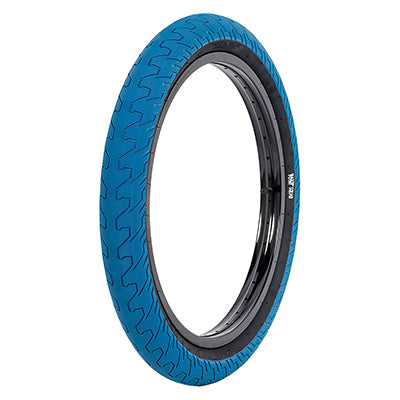 20x2.3 Blue Squad Bicycle Tire with black rim, featuring a micro knurled tread design for high contact area and minimal rolling resistance, suitable for medium pressure cushioning on big drops.